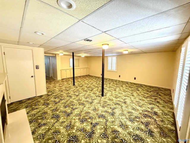 basement with a drop ceiling