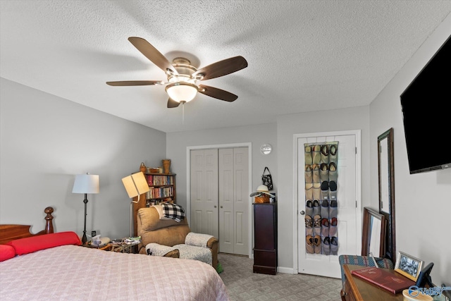 2413 Remington Cir SW, Decatur, AL 35601 - bedroom with ceiling fan and a textured ceiling
