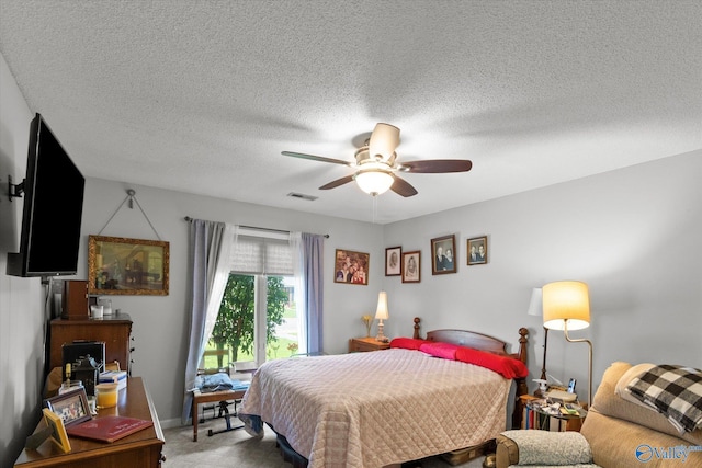 2413 Remington Cir SW, Decatur, AL 35601 - carpeted bedroom with a textured ceiling and ceiling fan