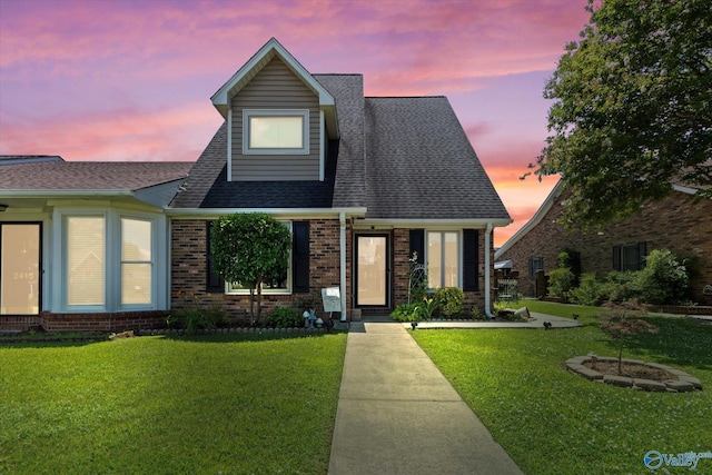 2413 Remington Cir SW, Decatur, AL 35601 - view of front of property with a lawn, brick siding, and a shingled roof