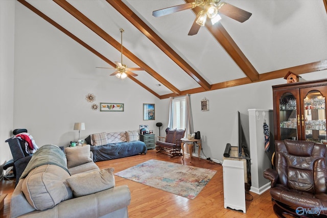 2413 Remington Cir SW, Decatur, AL 35601 - living room with ceiling fan, beamed ceiling, high vaulted ceiling, and wood finished floors