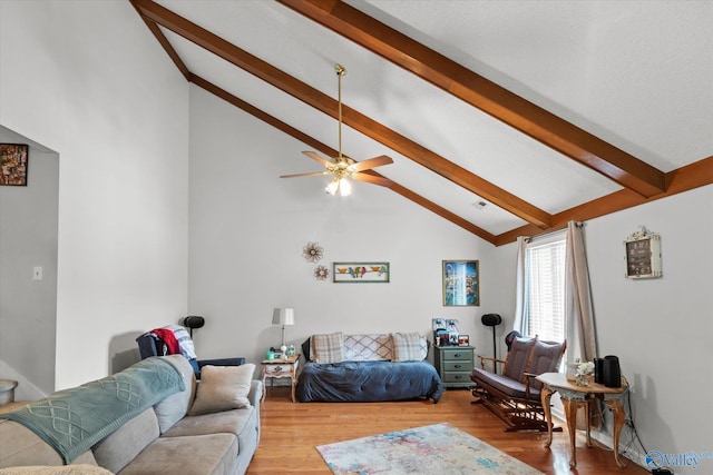 2413 Remington Cir SW, Decatur, AL 35601 - living room featuring beam ceiling, wood finished floors, a ceiling fan, and high vaulted ceiling