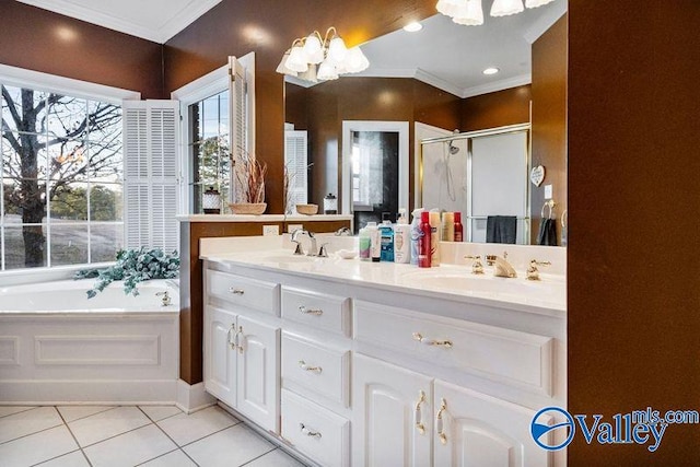 bathroom with an inviting chandelier, tile patterned floors, ornamental molding, and separate shower and tub