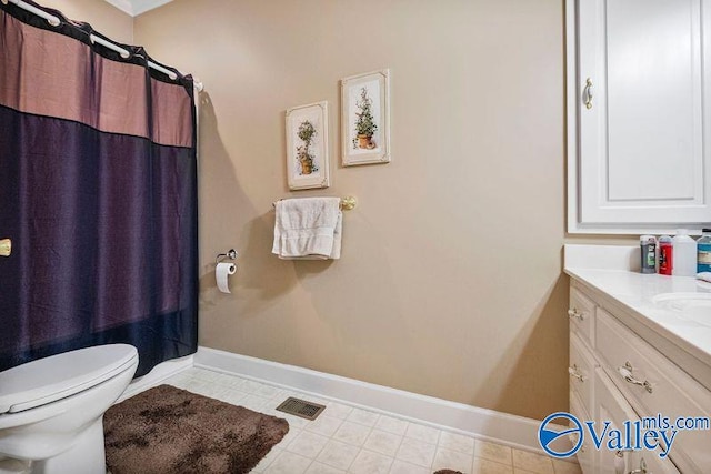 bathroom with vanity, a shower with curtain, and toilet