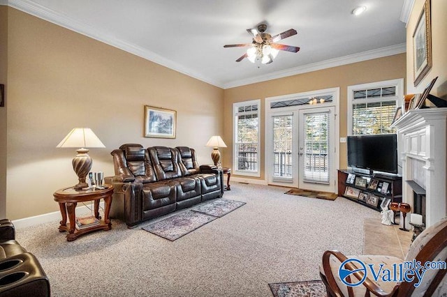 living room featuring crown molding, light carpet, ceiling fan, and french doors