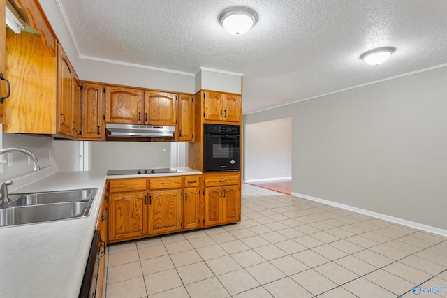 kitchen with black appliances, crown molding, sink, and light tile patterned floors