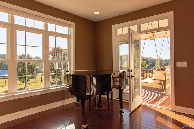 interior space with hardwood / wood-style flooring and french doors