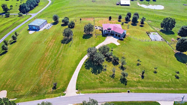 birds eye view of property featuring a rural view