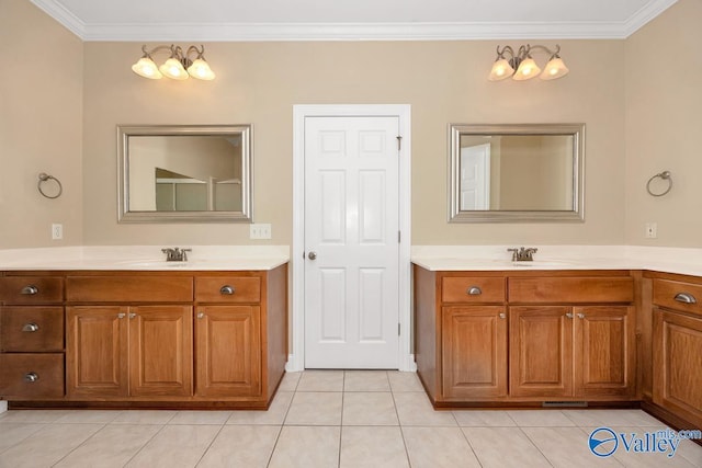 full bath with vanity, crown molding, and tile patterned flooring