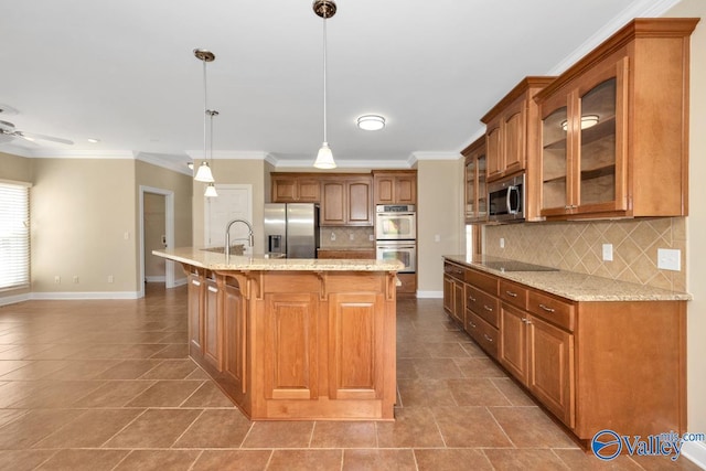 kitchen with glass insert cabinets, baseboards, a breakfast bar, brown cabinets, and appliances with stainless steel finishes