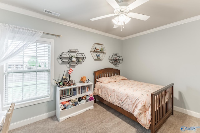 carpeted bedroom with baseboards, ornamental molding, and visible vents