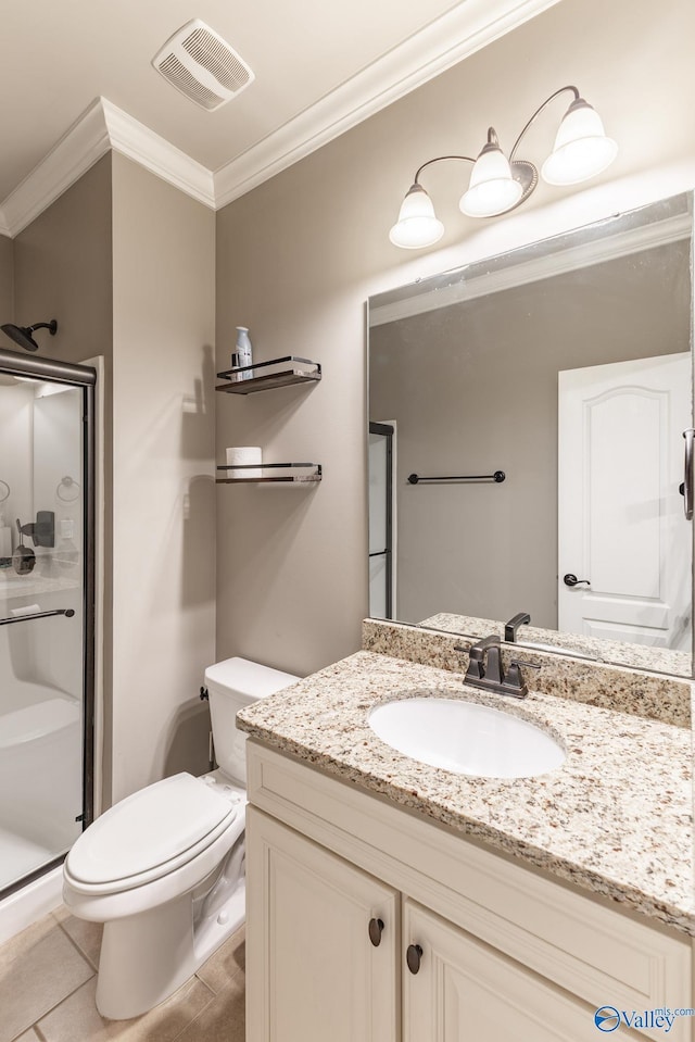 bathroom with vanity, a stall shower, crown molding, toilet, and visible vents