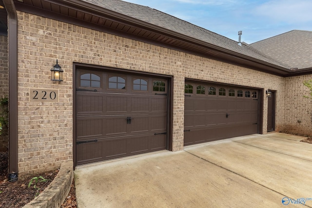 garage with driveway