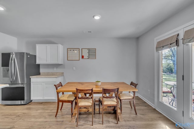 dining room featuring light hardwood / wood-style floors