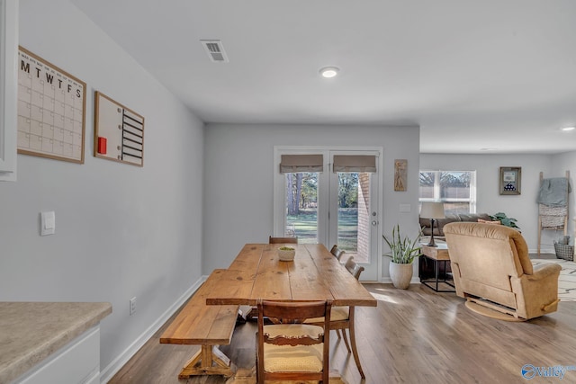 dining room featuring light hardwood / wood-style flooring