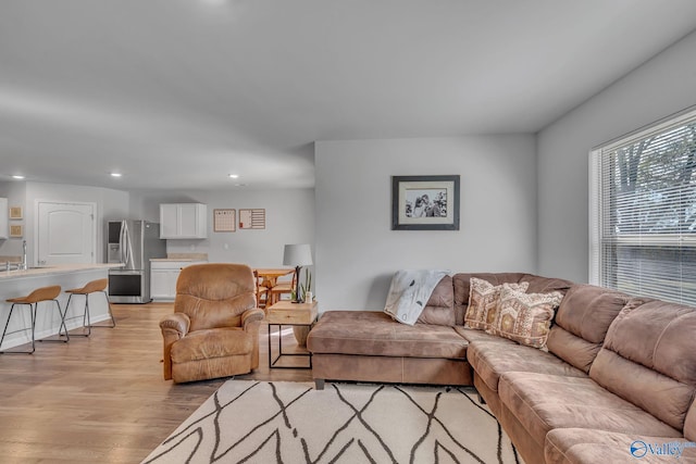 living room featuring light wood-type flooring