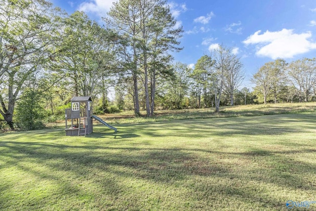 view of yard with a playground