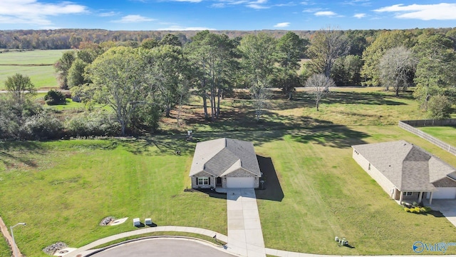 birds eye view of property featuring a rural view