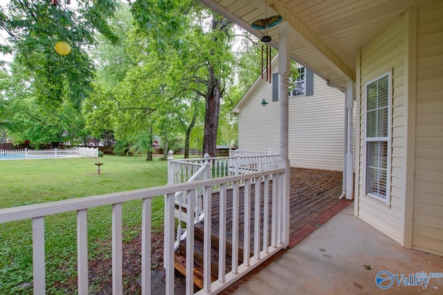 view of patio featuring fence