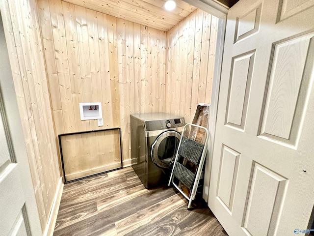 laundry room with washer / dryer, wooden walls, dark wood-type flooring, and wood ceiling