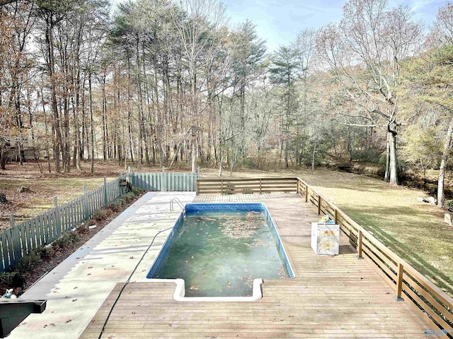 view of pool with a wooden deck