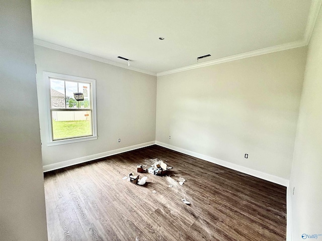 1005 Newbury Cv SW, Decatur, AL 35603 - unfurnished room featuring dark wood-style flooring, baseboards, and ornamental molding