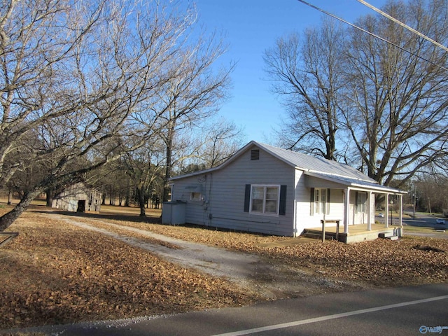 view of home's exterior with a porch