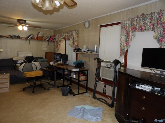 carpeted office space featuring ornamental molding and ceiling fan