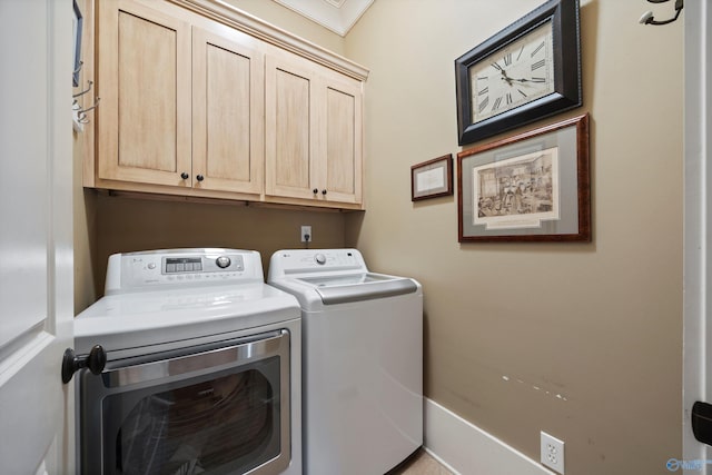 9 Beck St NW, Huntsville, AL 35806 - washroom with cabinet space and separate washer and dryer