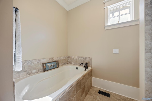 9 Beck St NW, Huntsville, AL 35806 - bathroom featuring a bath and tile patterned floors