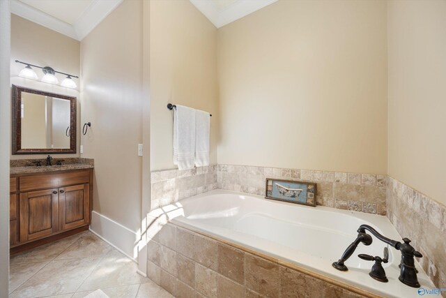 9 Beck St NW, Huntsville, AL 35806 - bathroom featuring a garden tub, vanity, tile patterned flooring, and crown molding