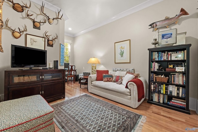 9 Beck St NW, Huntsville, AL 35806 - living room featuring wood finished floors and crown molding
