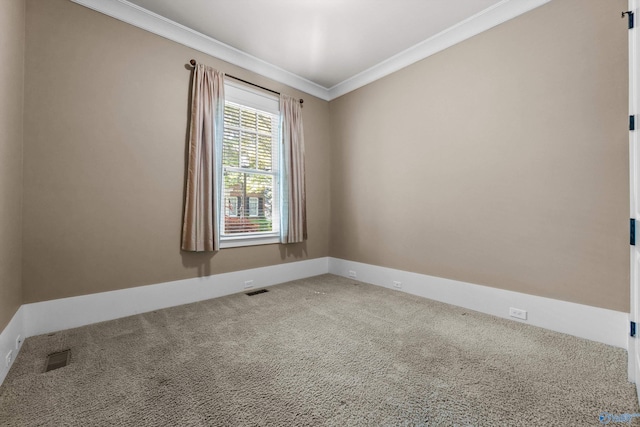 9 Beck St NW, Huntsville, AL 35806 - empty room featuring baseboards, visible vents, carpet, and ornamental molding