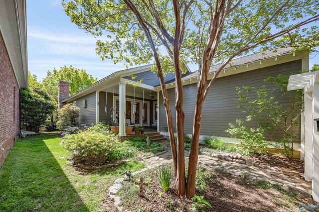 9 Beck St NW, Huntsville, AL 35806 - rear view of house featuring covered porch, french doors, and a yard