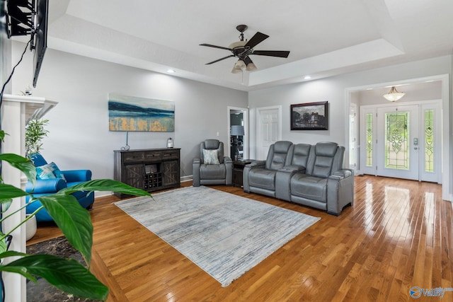 2801 Mountain View Dr, Southside, AL 35907 - living area with a tray ceiling, a fireplace, wood finished floors, ceiling fan, and recessed lighting