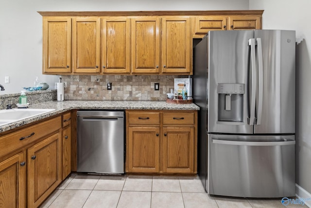 2801 Mountain View Dr, Southside, AL 35907 - kitchen with appliances with stainless steel finishes and brown cabinetry