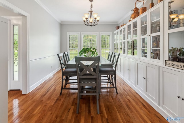 2801 Mountain View Dr, Southside, AL 35907 - dining area featuring a chandelier, crown molding, and wood finished floors