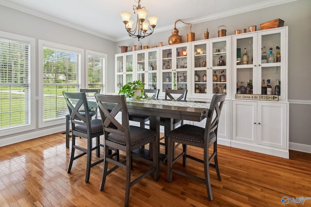 2801 Mountain View Dr, Southside, AL 35907 - dining room with a chandelier, plenty of natural light, ornamental molding, and wood finished floors