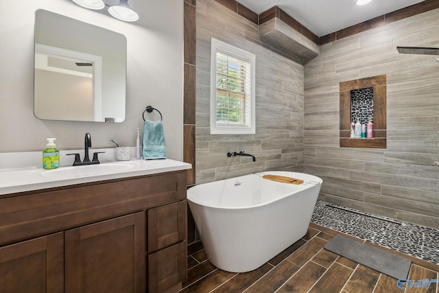 2801 Mountain View Dr, Southside, AL 35907 - full bathroom with a soaking tub, vanity, and tile walls