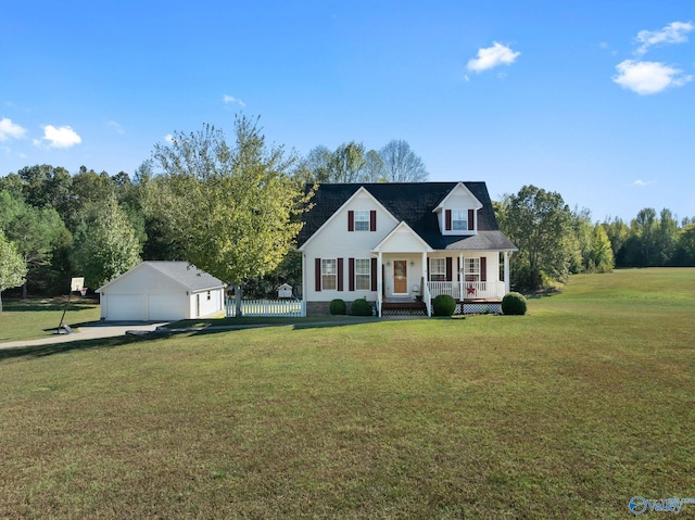 new england style home featuring a garage, an outdoor structure, a front lawn, and a porch