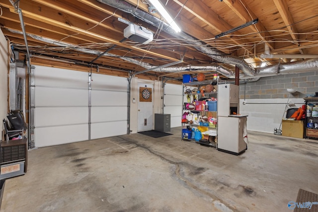 garage featuring a garage door opener