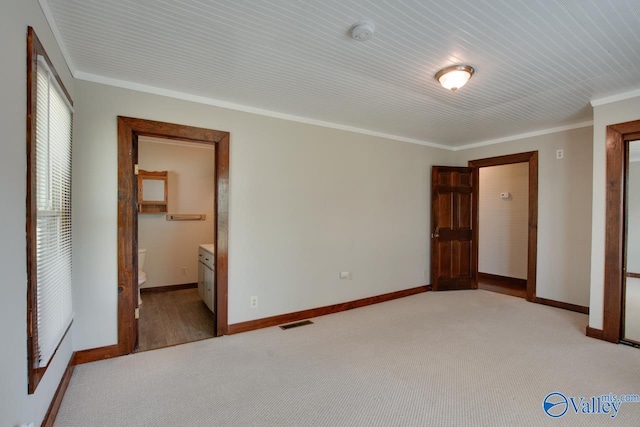 482 Mount Zion Rd, Madison, AL 35757 - unfurnished bedroom featuring light colored carpet, ornamental molding, and ensuite bathroom