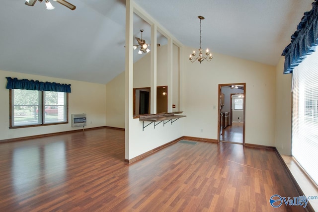482 Mount Zion Rd, Madison, AL 35757 - unfurnished living room featuring heating unit, a ceiling fan, wood finished floors, high vaulted ceiling, and a chandelier