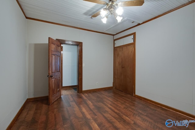 unfurnished bedroom with ceiling fan, dark hardwood / wood-style floors, and crown molding