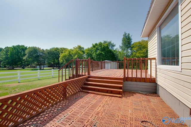 deck featuring a yard