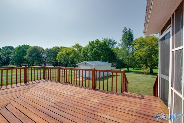 482 Mount Zion Rd, Madison, AL 35757 - deck featuring an outbuilding, a lawn, and view of wooded area