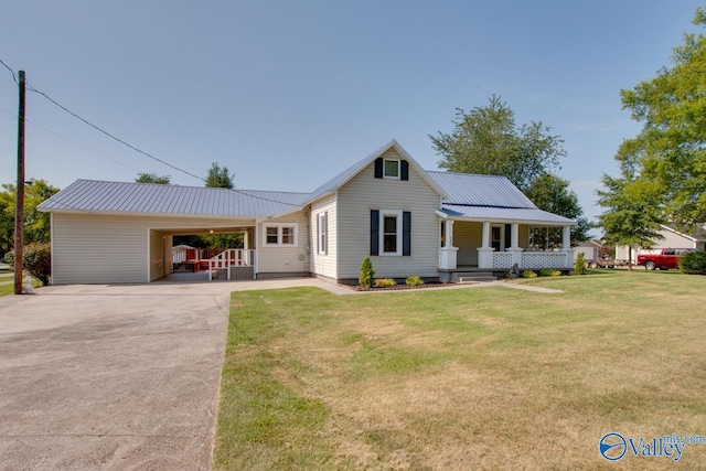 view of front facade with covered porch, a front lawn, and a carport