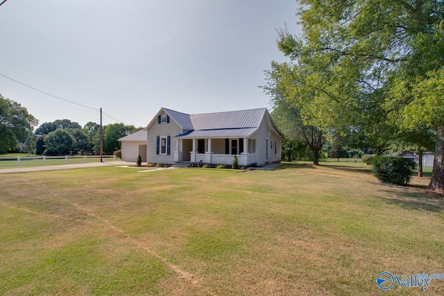 482 Mount Zion Rd, Madison, AL 35757 - farmhouse-style home with a porch, concrete driveway, and a metal roof