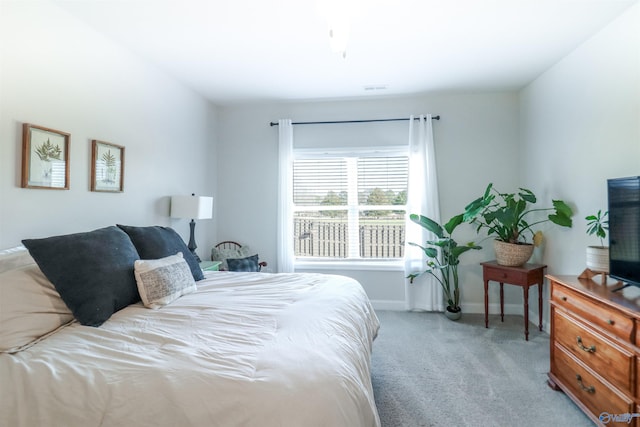 bedroom with light carpet