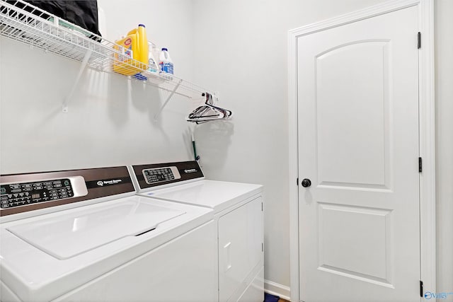 laundry room with washer and dryer